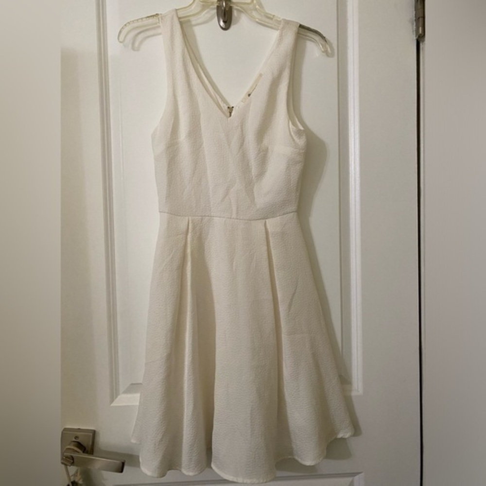 Cream color dress by The Impeccable pig
